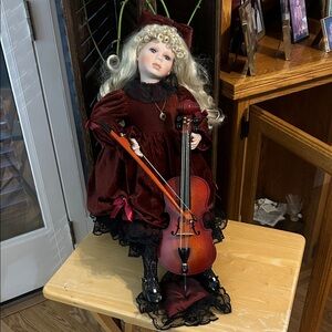 Kingstate the Doll Maker - Pamela with her cello
